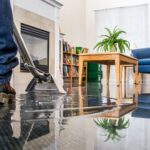 Professional water extraction and flood repair service in a flooded living room